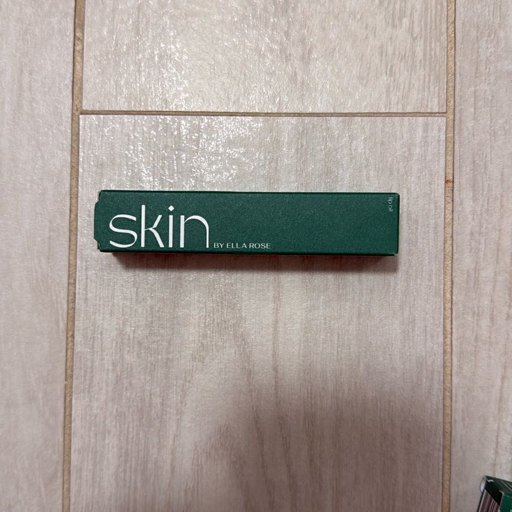 NWT skin by Ella lip oil